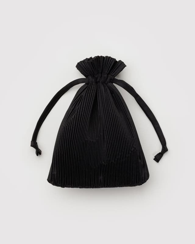 Pleated Baggu black drawstring pouch with gathered top and braided cord ties