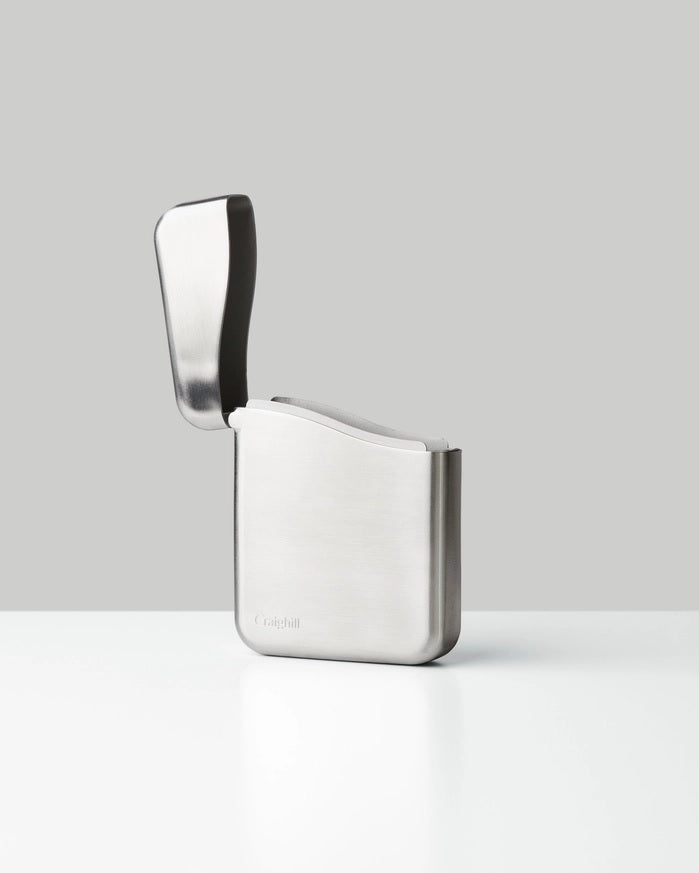 Stainless steel playing card case with side opening, compact front view