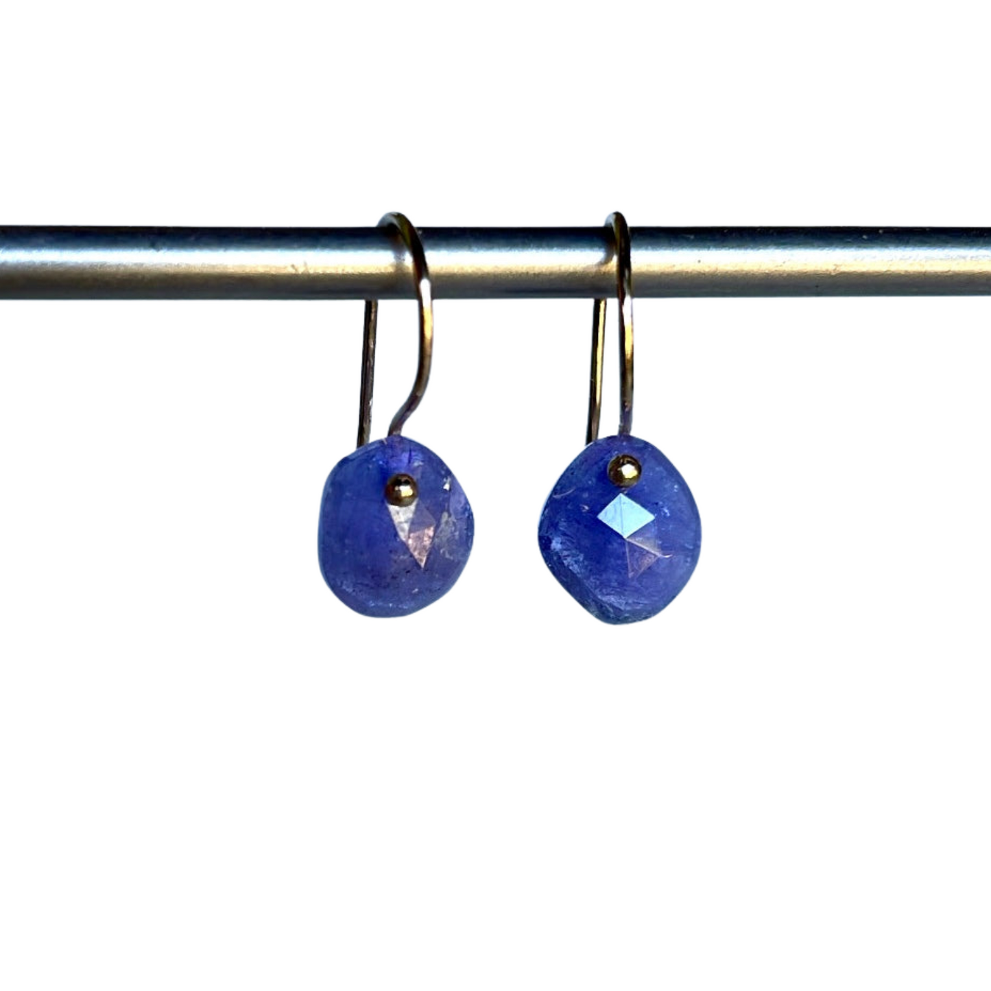 Blue oval gemstone drop earrings on gold-tone hooks