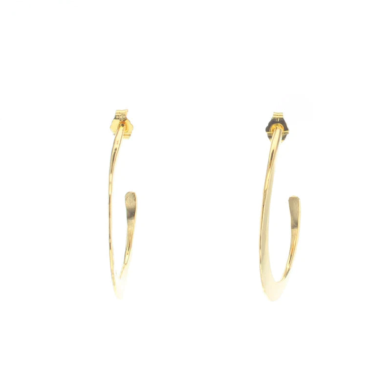 Gold filled oval hoop earrings shown from side with hinged clasp detail