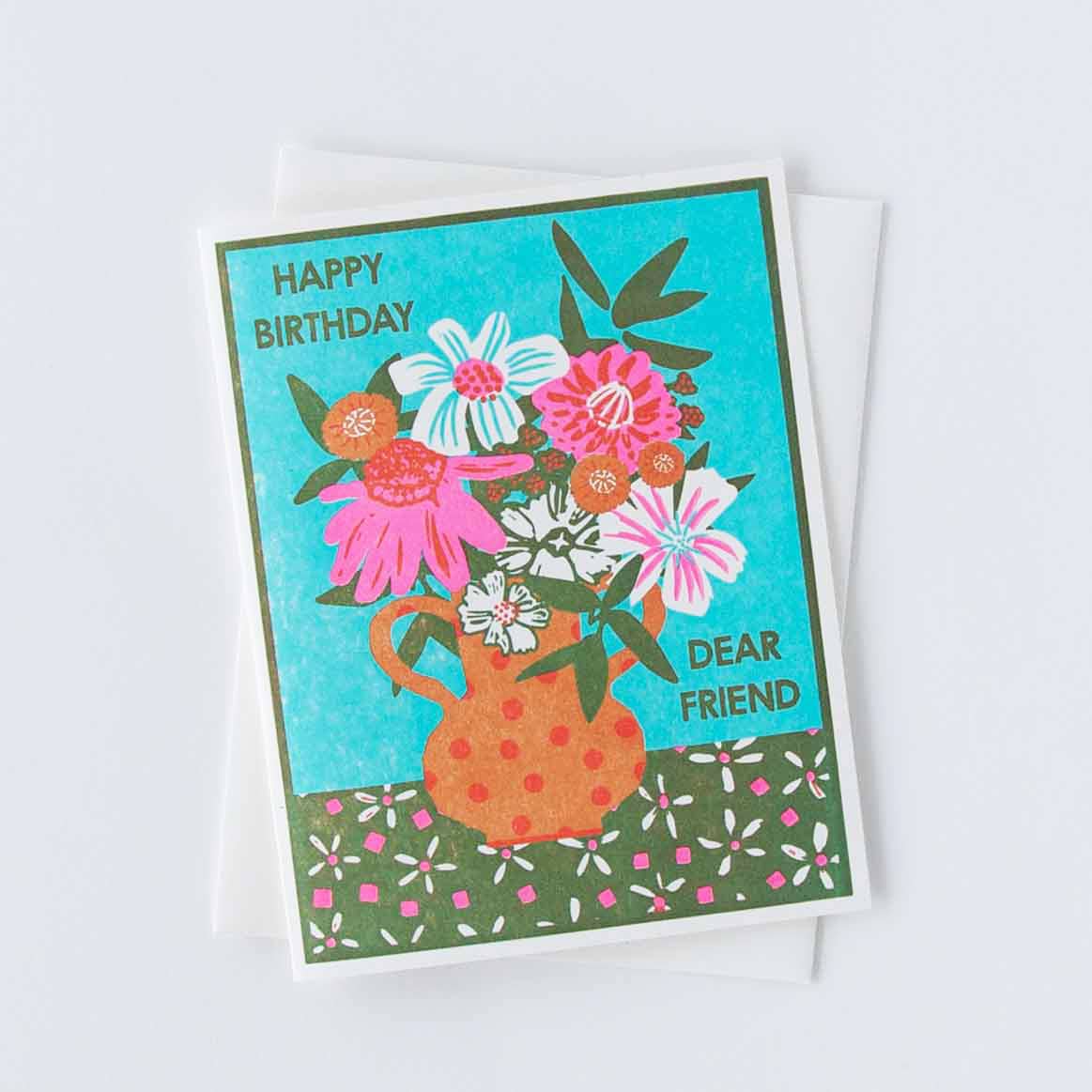 Birthday greeting card with teal floral vase, flowers, and 'Dear Friend' text