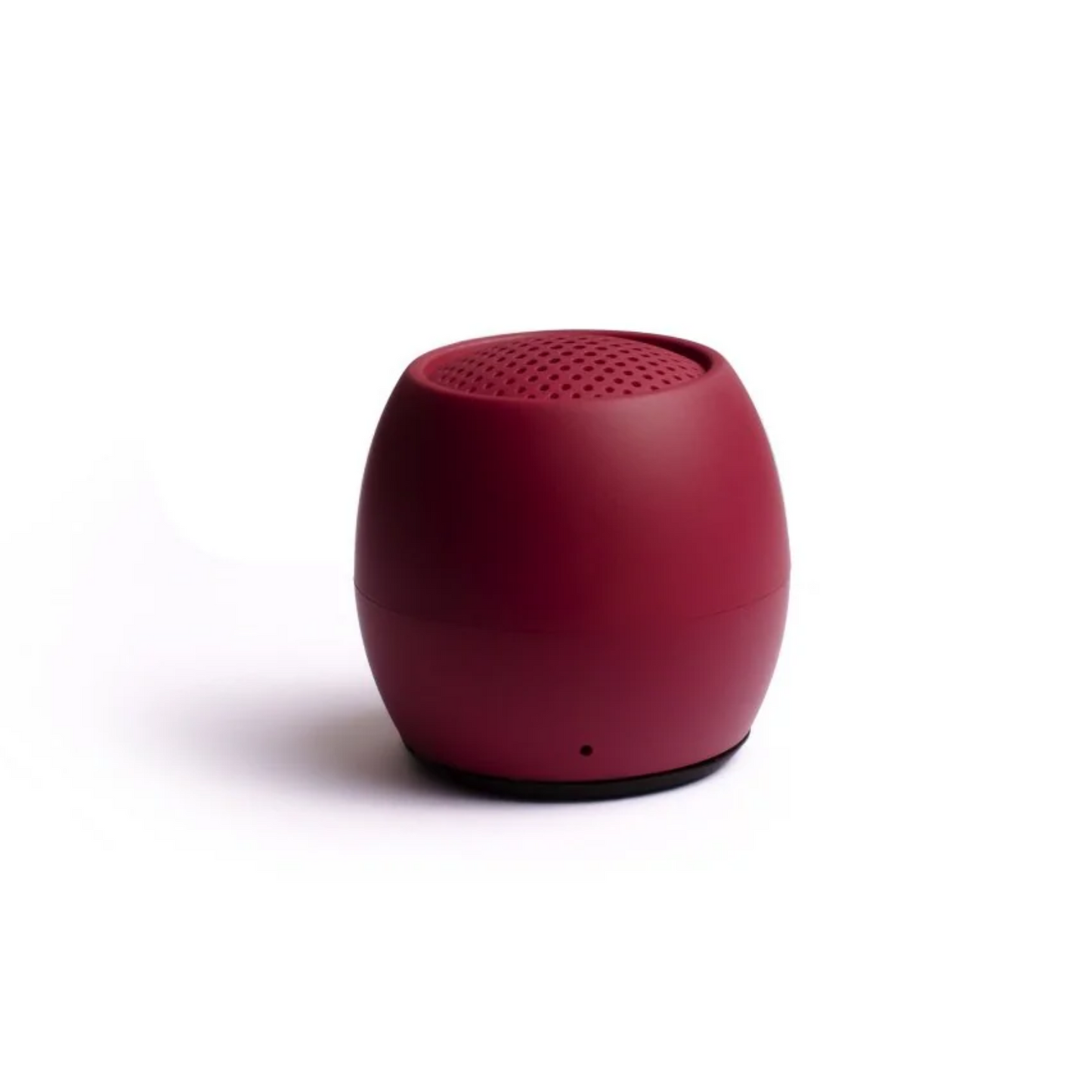Mini wireless speaker in dark red with a top speaker grille