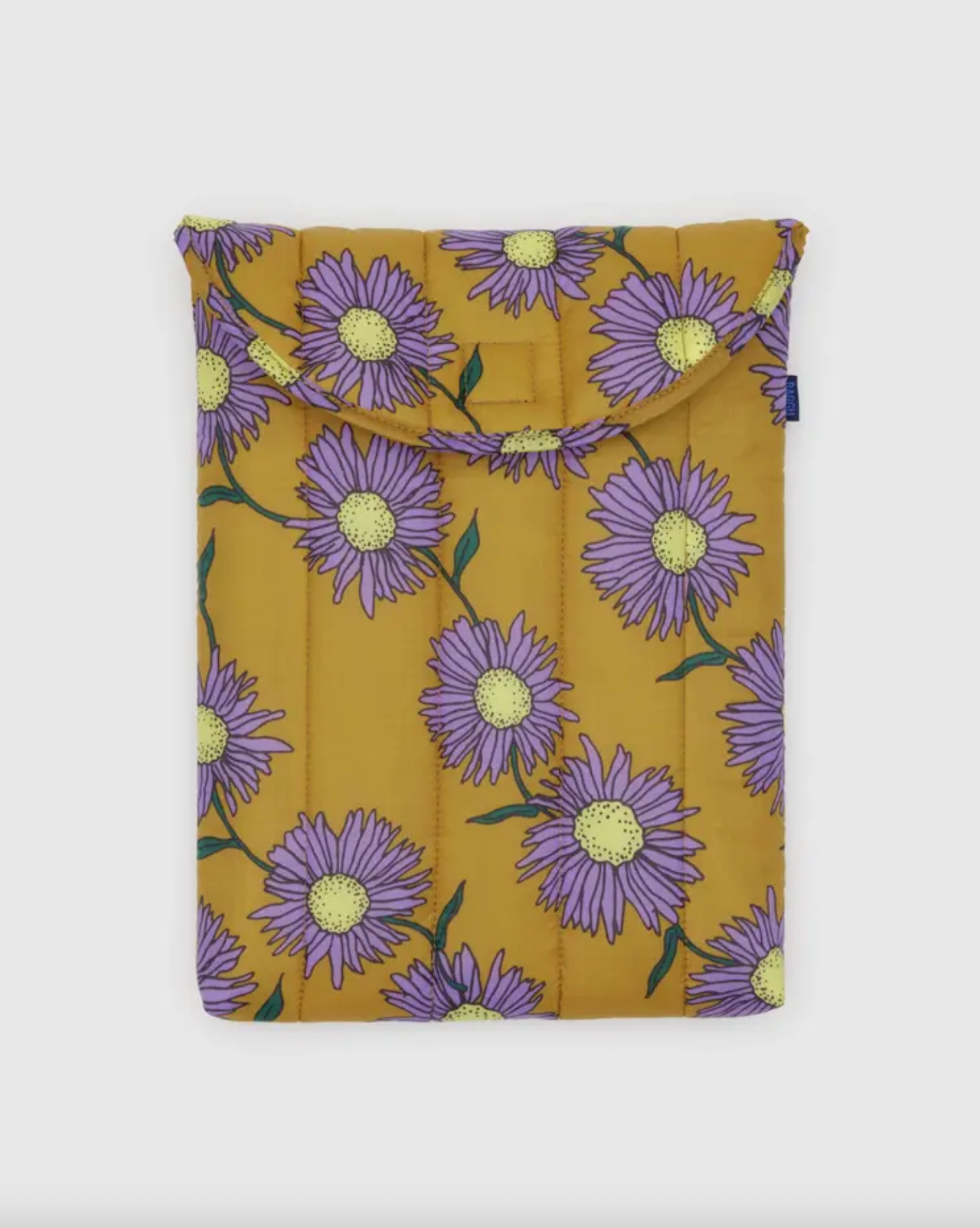 Mustard-yellow puffy 13"/14" laptop sleeve with purple daisy pattern and top flap.