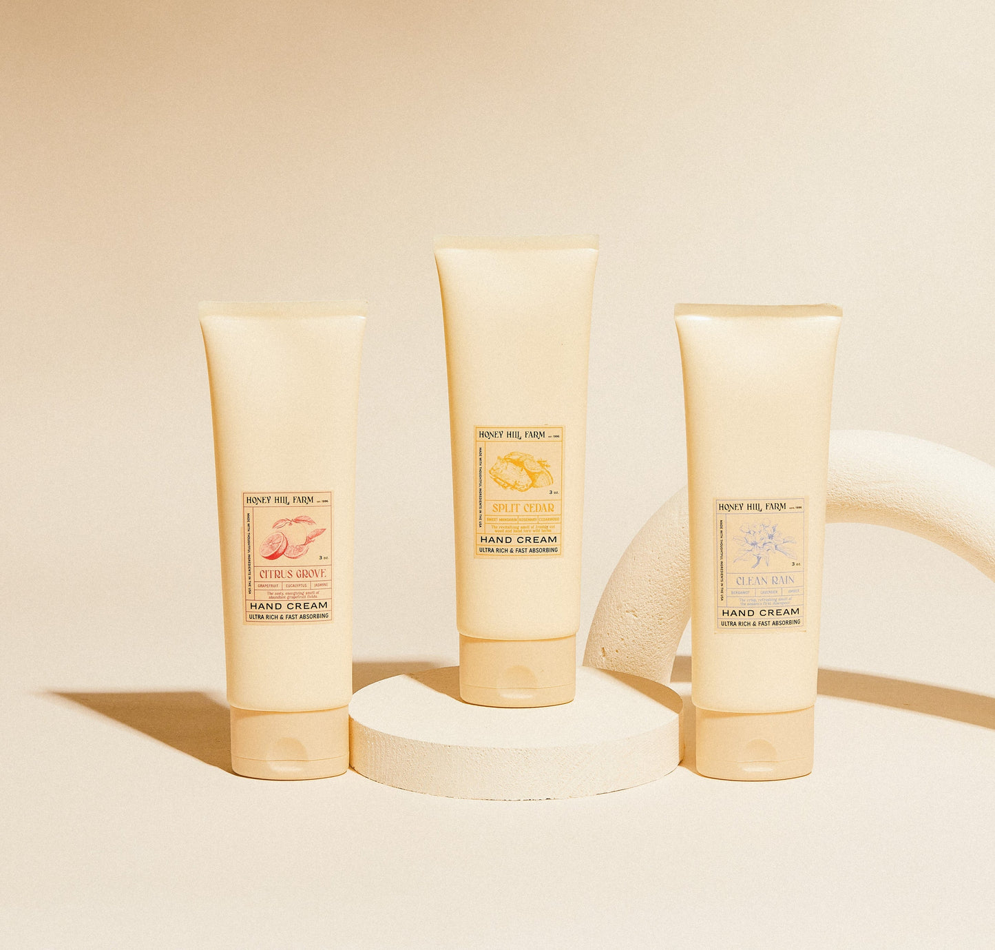Hand cream set: three pale-yellow tubes with labels for three scents