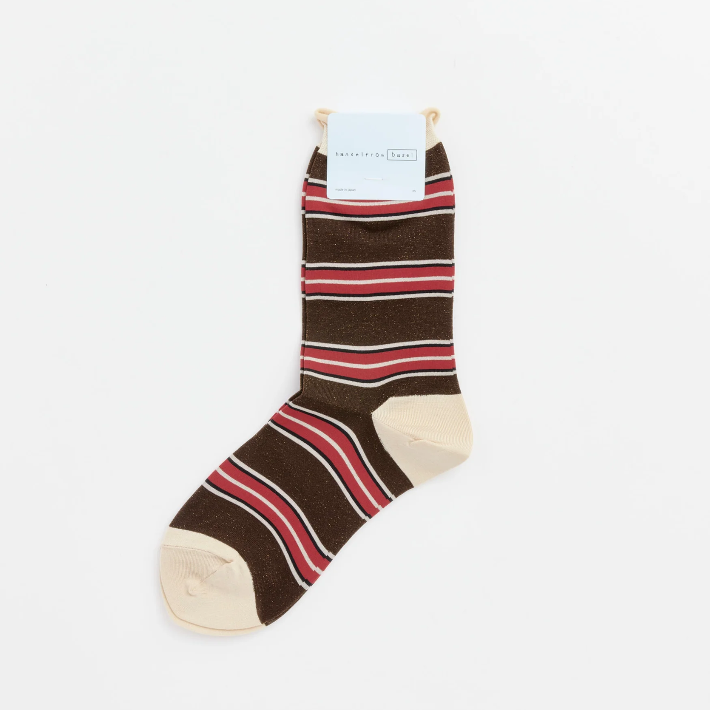 Brown striped crew socks with red, white, and black bands