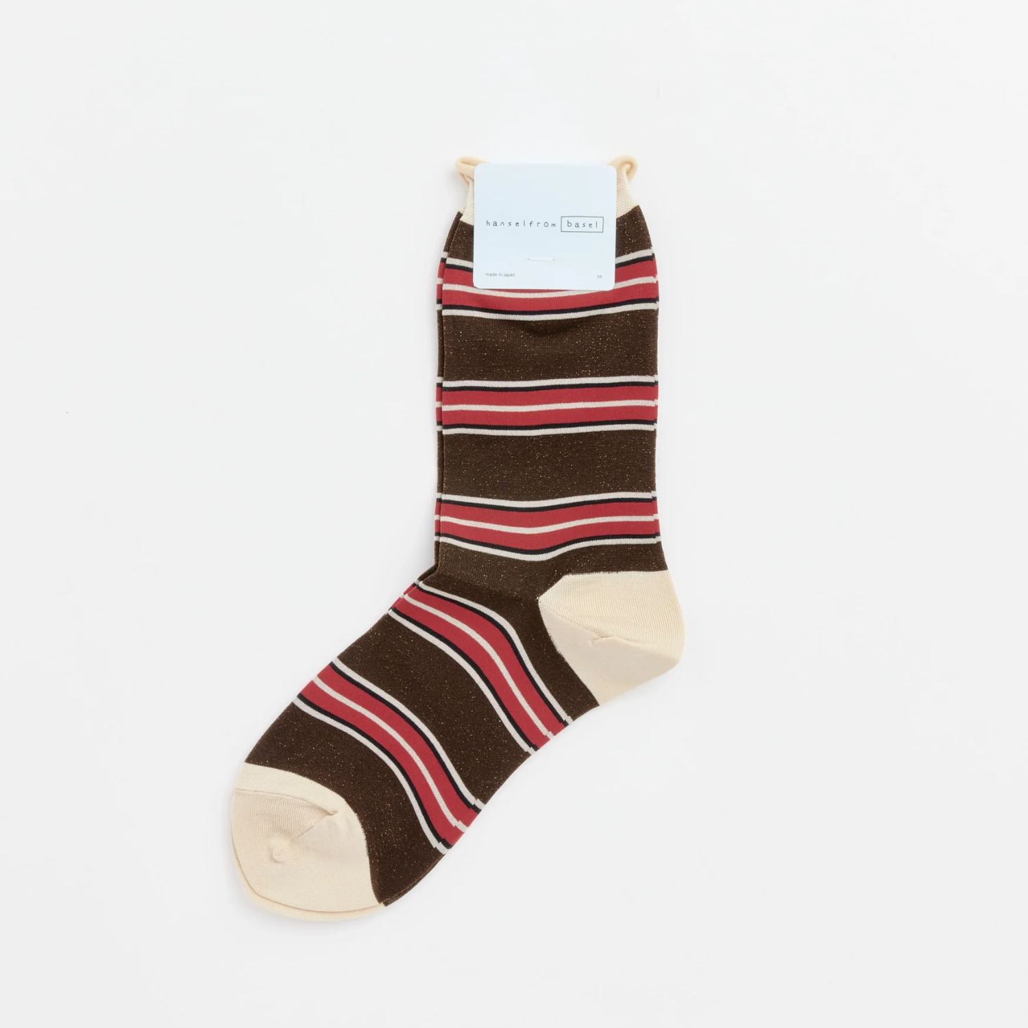 Brown striped crew socks with red, white, and black bands