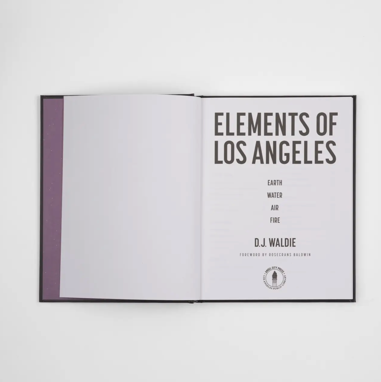 Open book with 'EARTH, WATER, AIR, FIRE' headings and author name on right page
