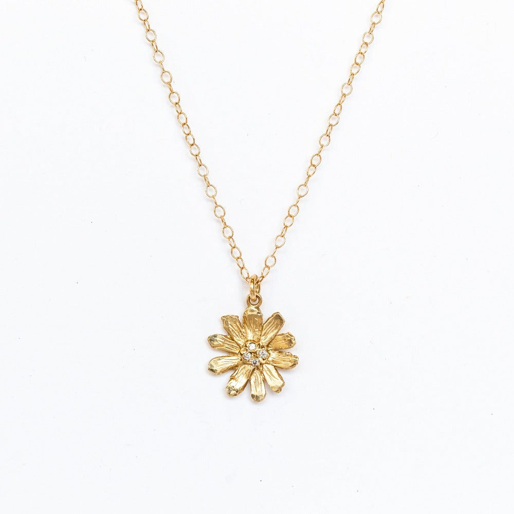 Daisy flower pendant necklace in gold with fine linked chain and round bail