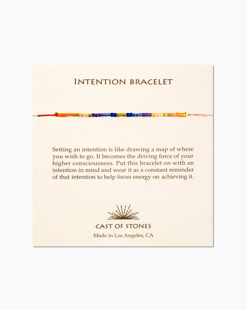 Intention bracelet with red cord and blue-orange bead pattern, adjustable fit
