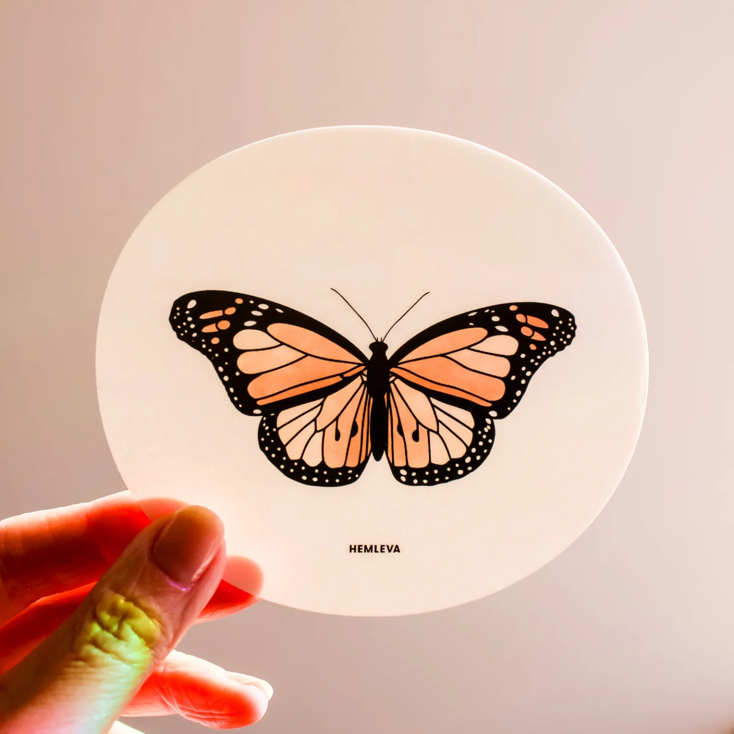 Medium butterfly suncatcher, round white panel with orange and black butterfly design