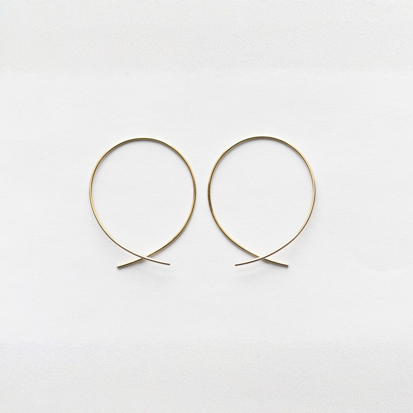 Large round threader earrings, gold-tone wire with curved dangling ends