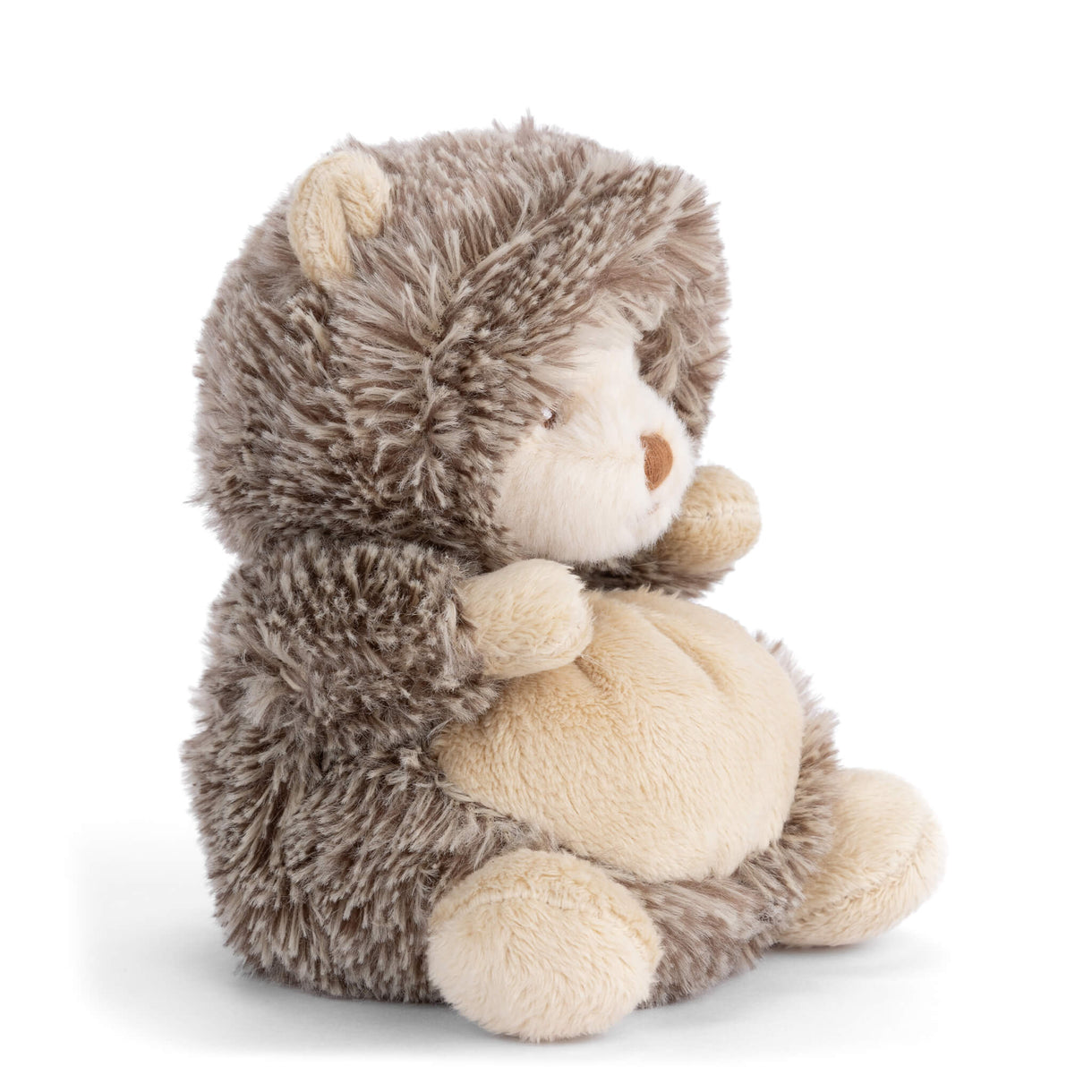 Hedgehog plush toy in side view, gray-brown fur, cream face, tan belly and paws