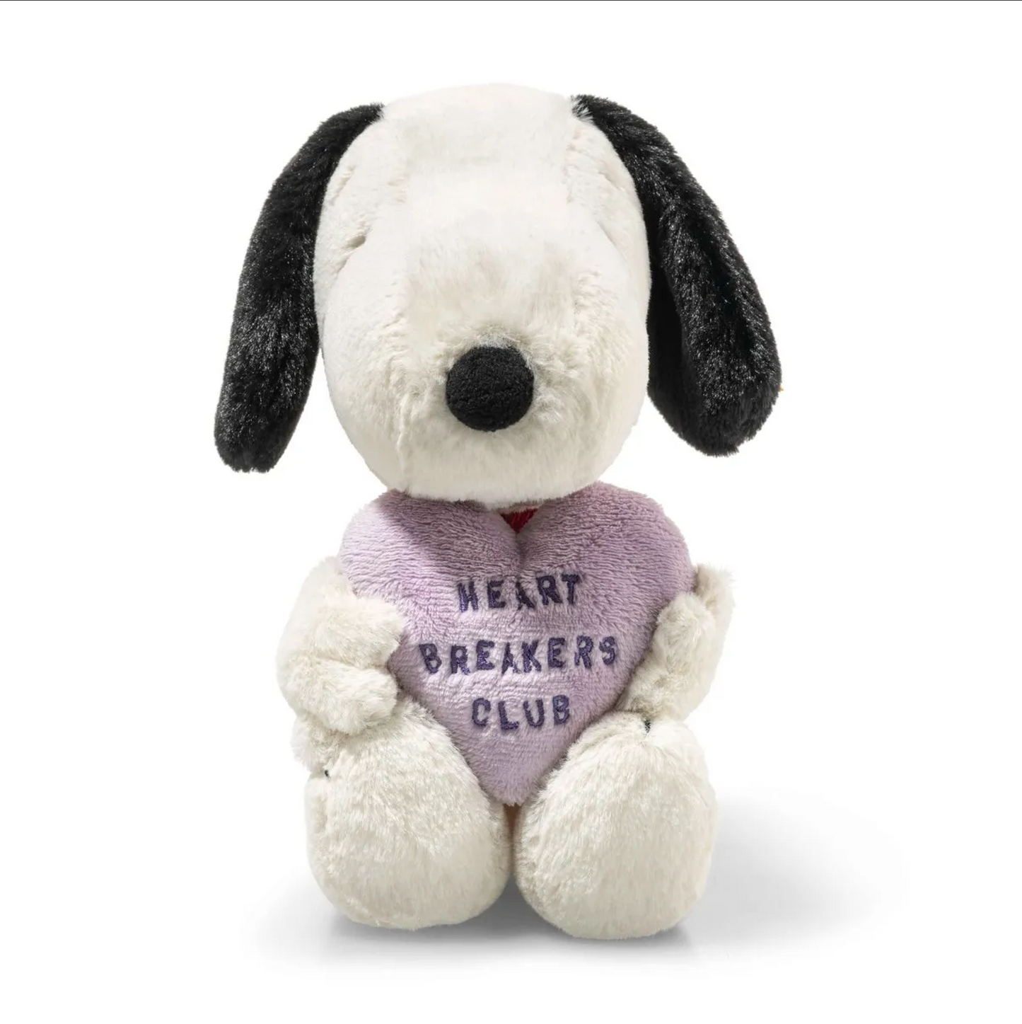 Plush dog toy with black ears and purple Heartbreakers Club heart on chest