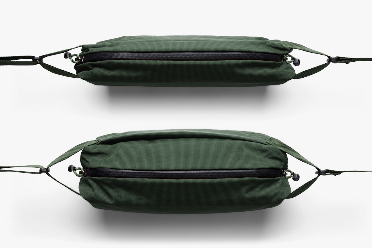 Green sling bag views showing top zipper closure and adjustable strap loops