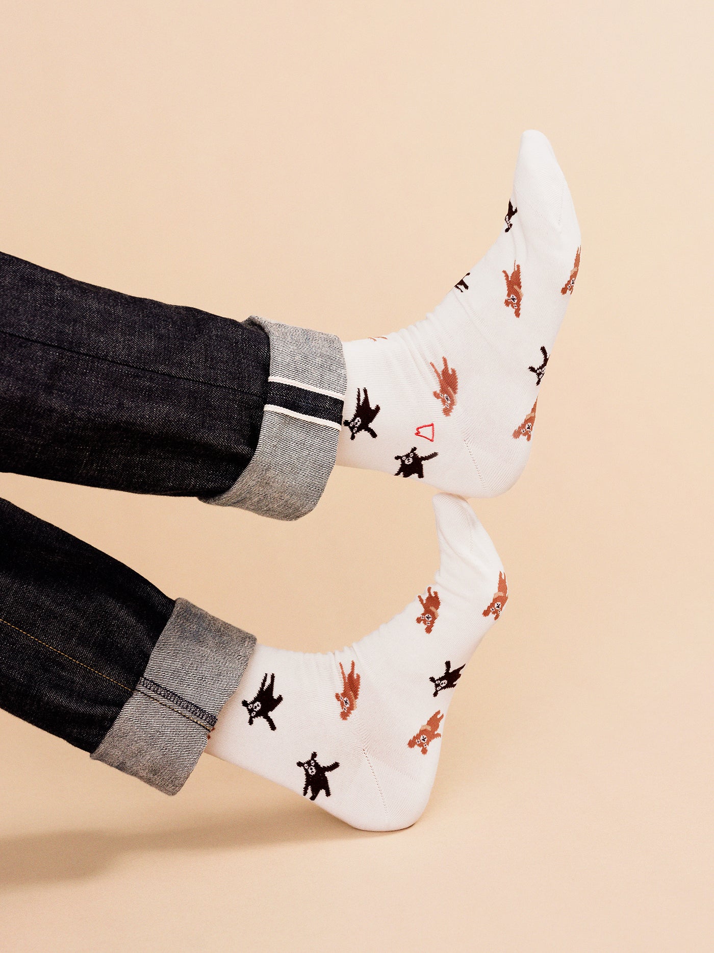 Ivory crew socks on jeans cuffs, scattered bear and black dog print pattern