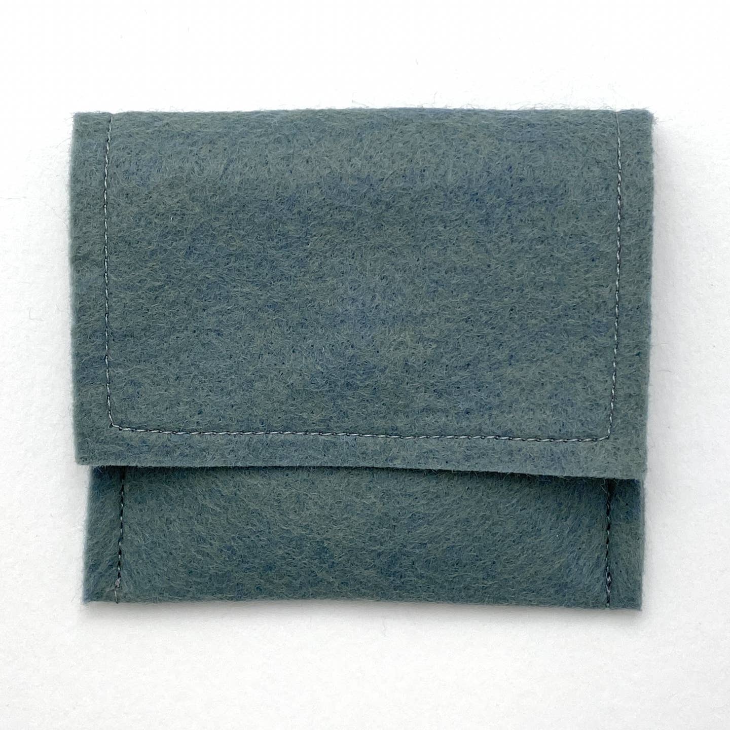 Blue wool-felt pocket mirror pouch with stitched flap and fold-over closure