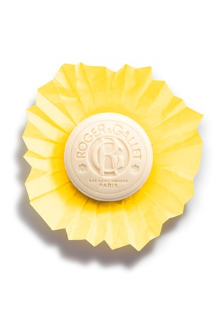 Ruffled yellow citron soap bar with Roger & Gallet logo embossed at center