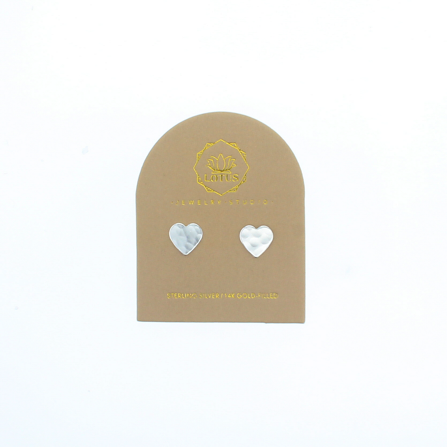 Heart stud earrings with silver-tone heart tops on a display card