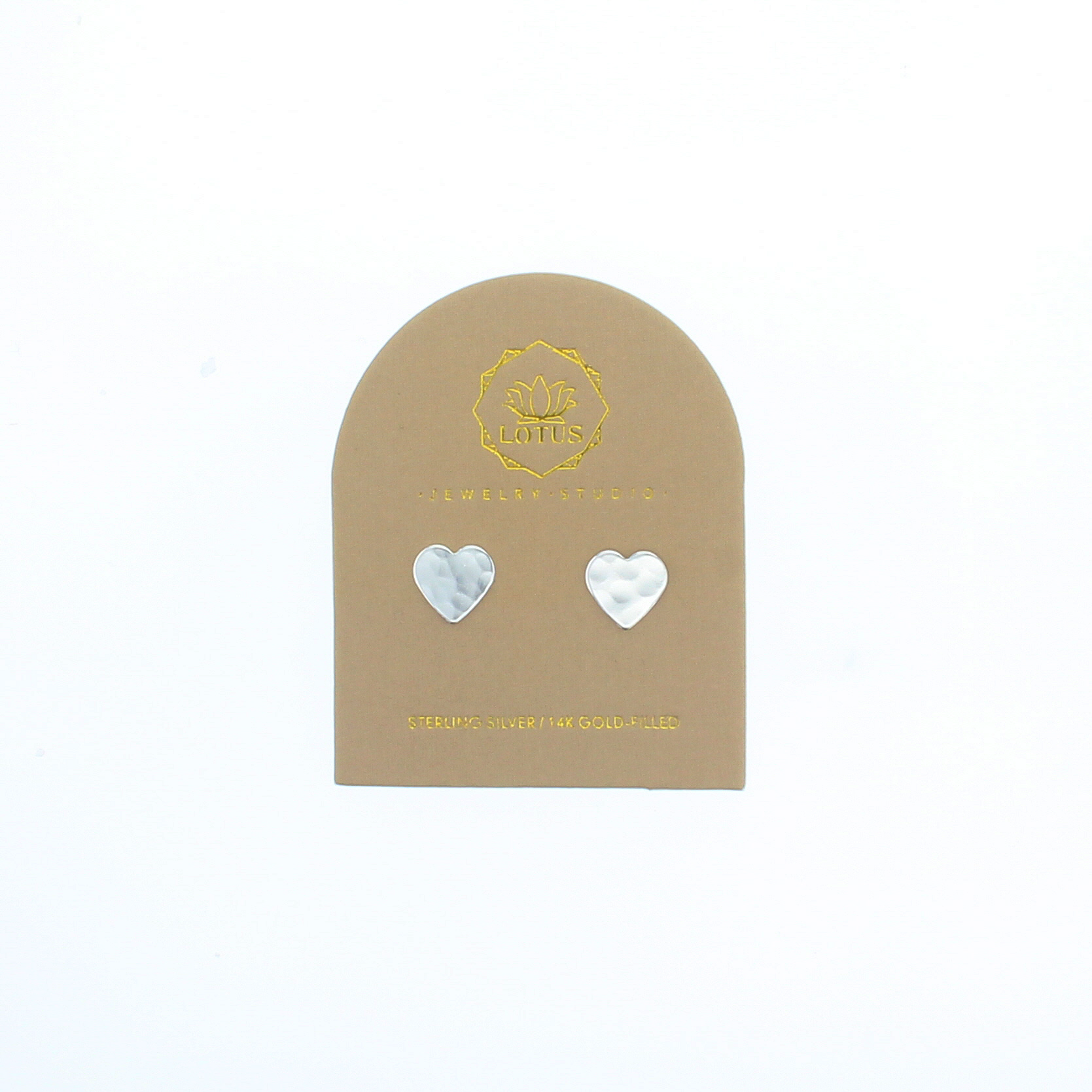 Heart stud earrings with silver-tone heart tops on a display card