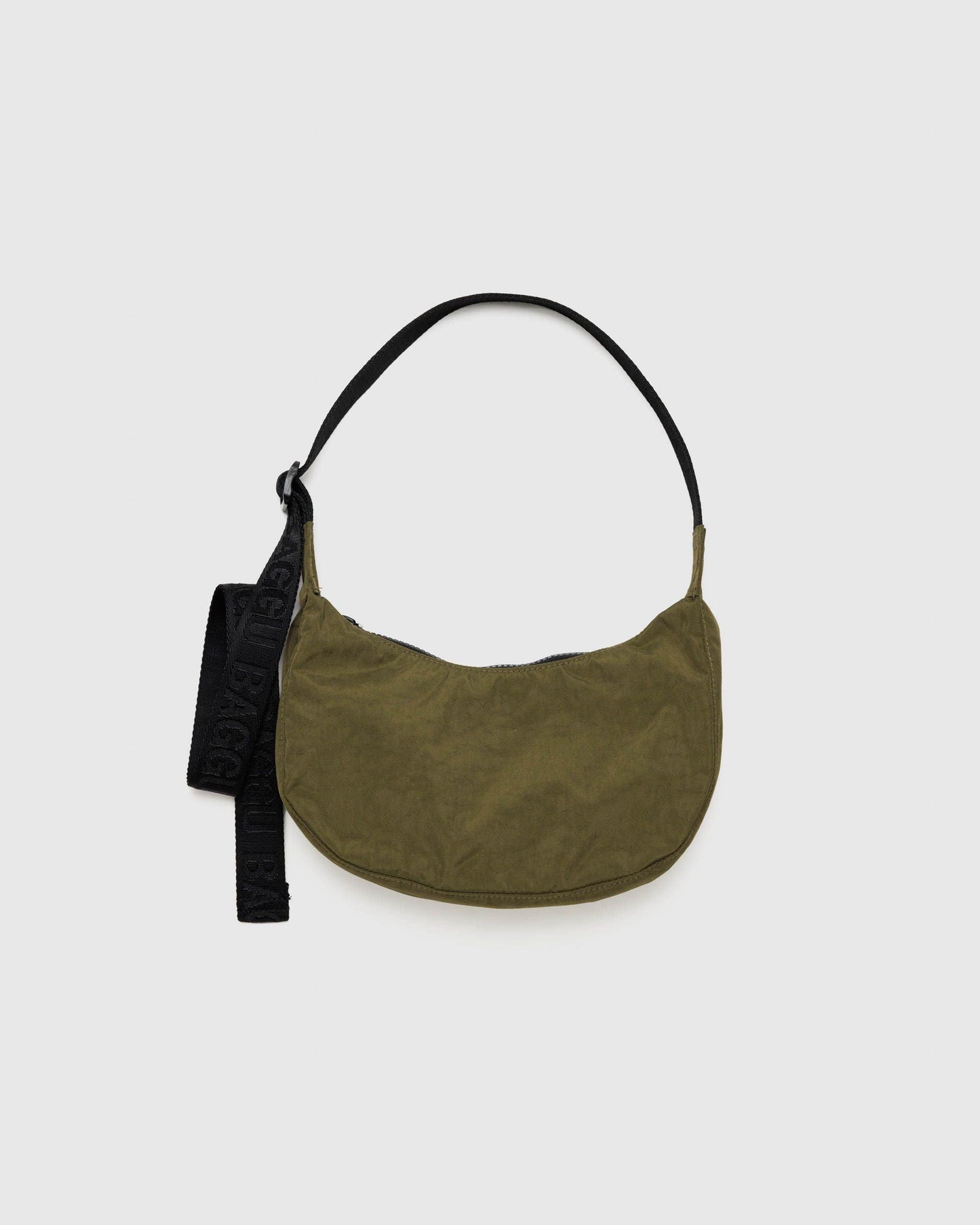 Small nylon crescent bag in olive green with black strap and hanging tag