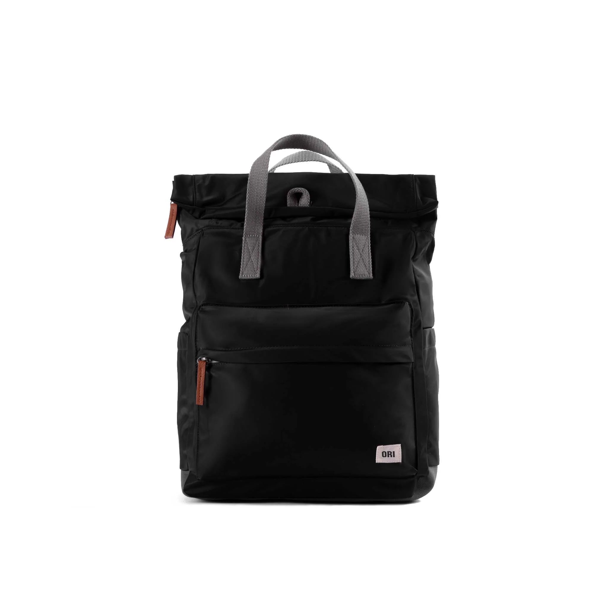 Black medium nylon backpack with twin top handles, front pocket, and zip closure