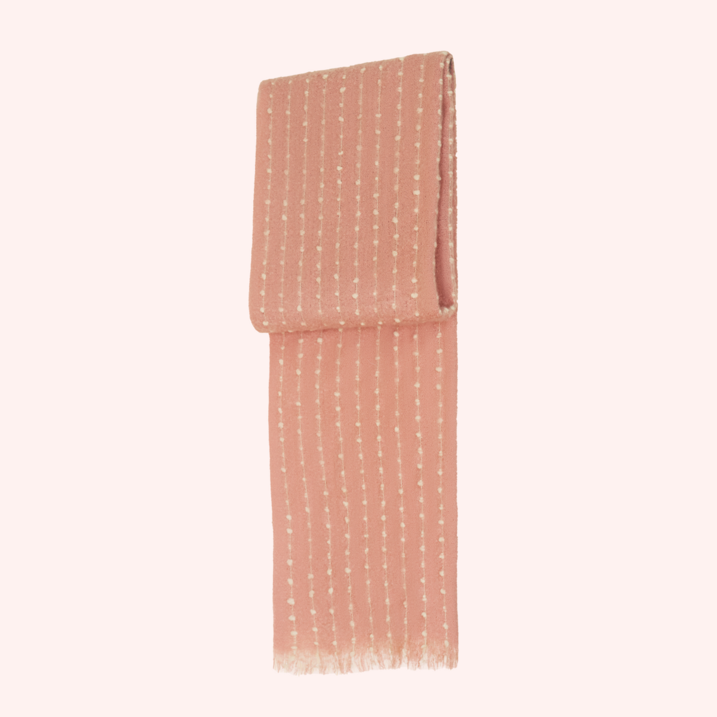 Petal Pink scarf with dotted vertical pattern and long fringe ends