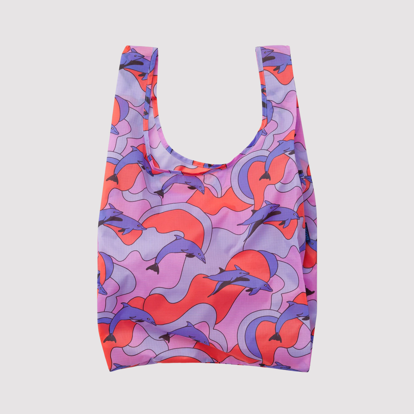 Reusable tote bag with purple and pink dolphin pattern