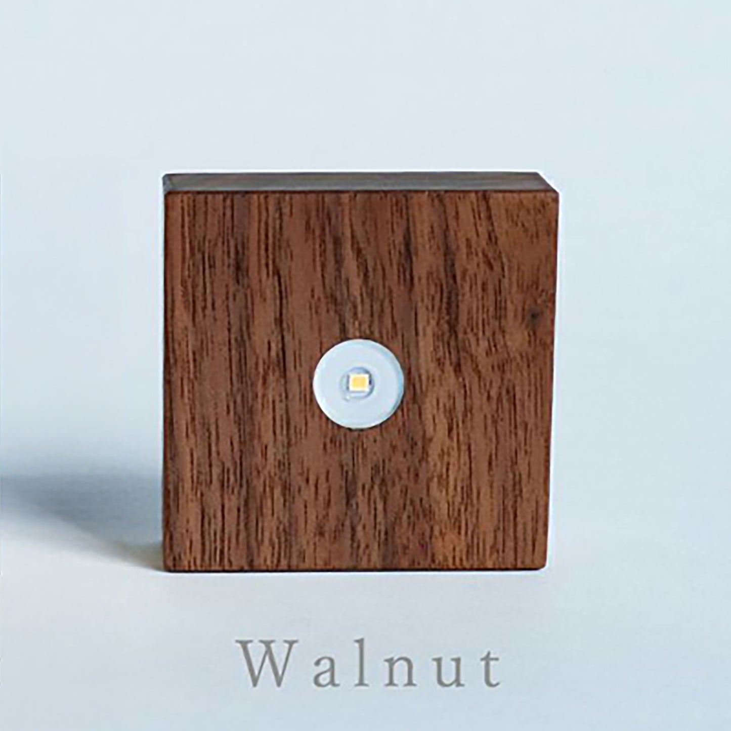 Walnut wood cube light base with round LED button
