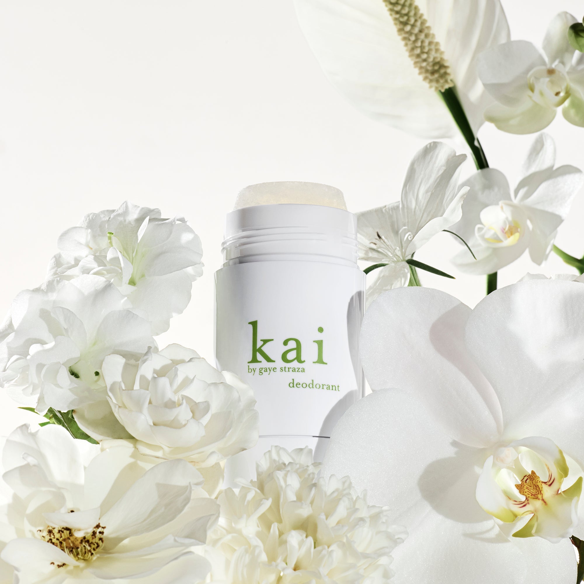 Kai deodorant stick, 2 oz, white container with green logo