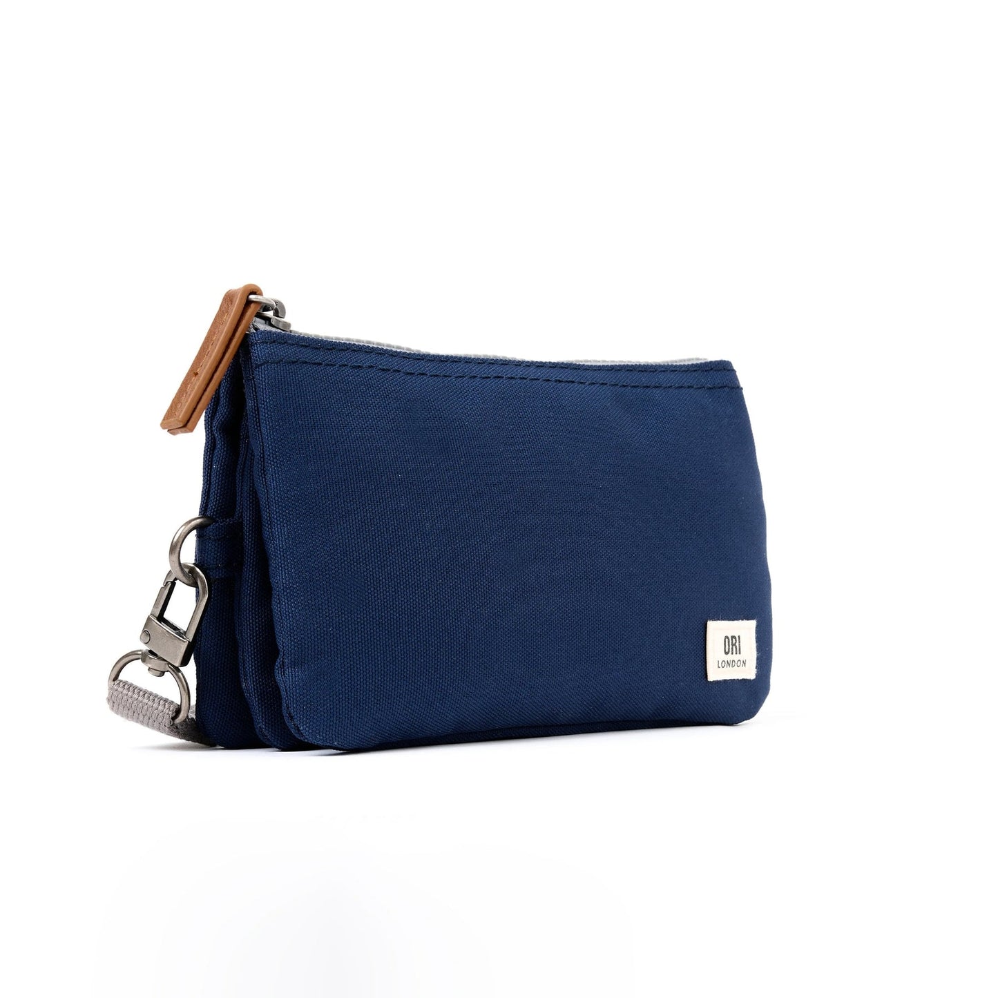 Medium recycled canvas zipper pouch in solid navy with key ring and tan zipper pull tab.