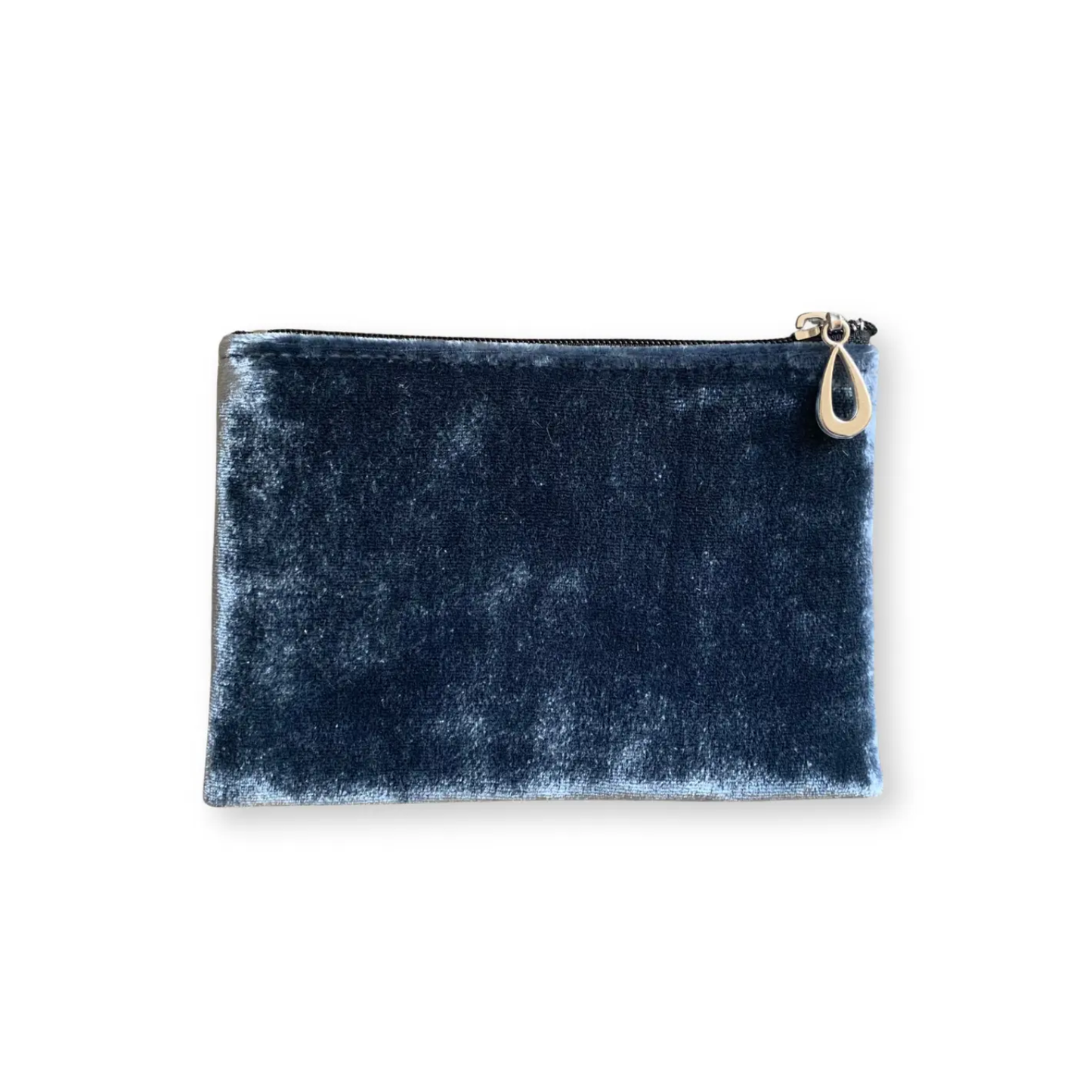 Small silk velvet pouch in denim blue with zip top and teardrop zipper pull.