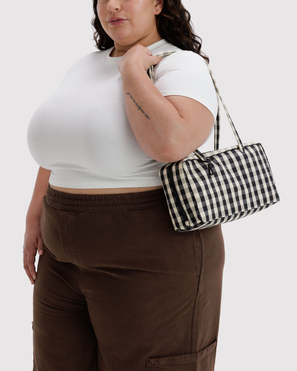 Black and white gingham nylon bowler bag with top handles and zip closure