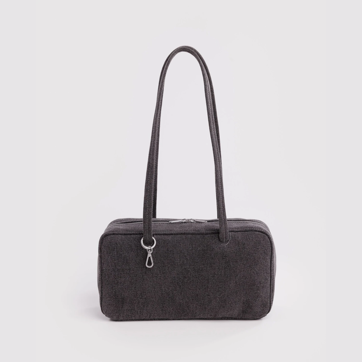 Washed black denim bowler bag with top handles and zip closure
