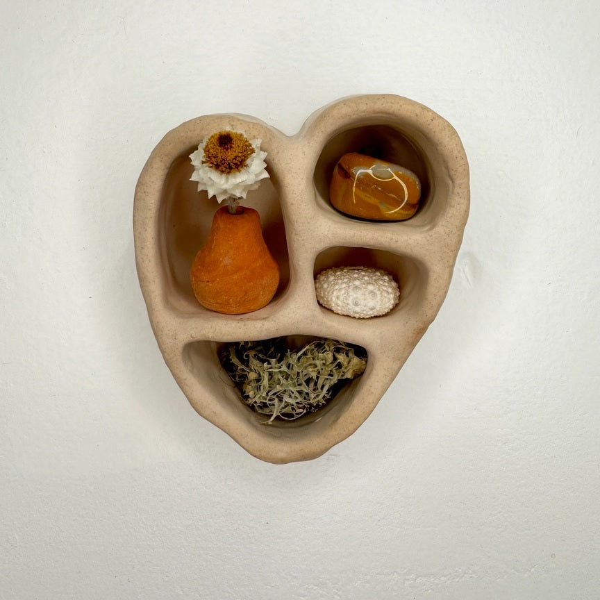 Sand-colored cement heart trinket holder with 4 inset compartments