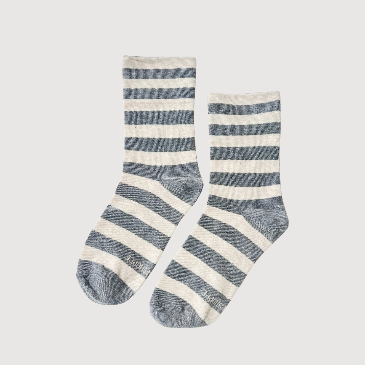 Pair of navy-and-cream striped crew socks with ribbed cuffs.
