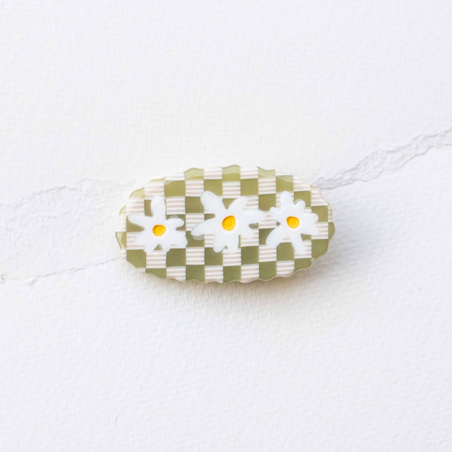 Lime acetate hair clip with checker print and daisy flower details