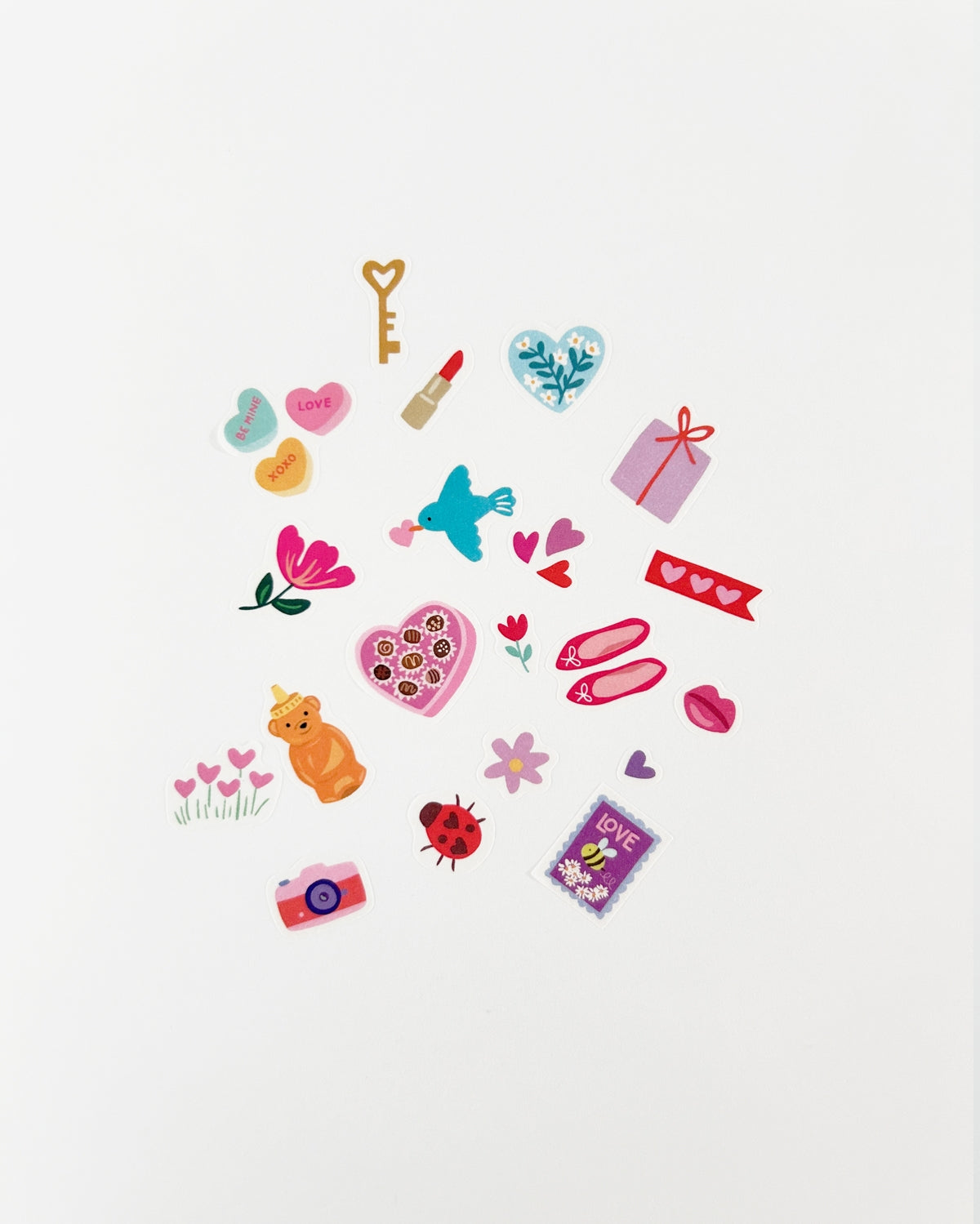 Sheet of love-themed washi stickers with animals, hearts, gifts, flowers, and cameras