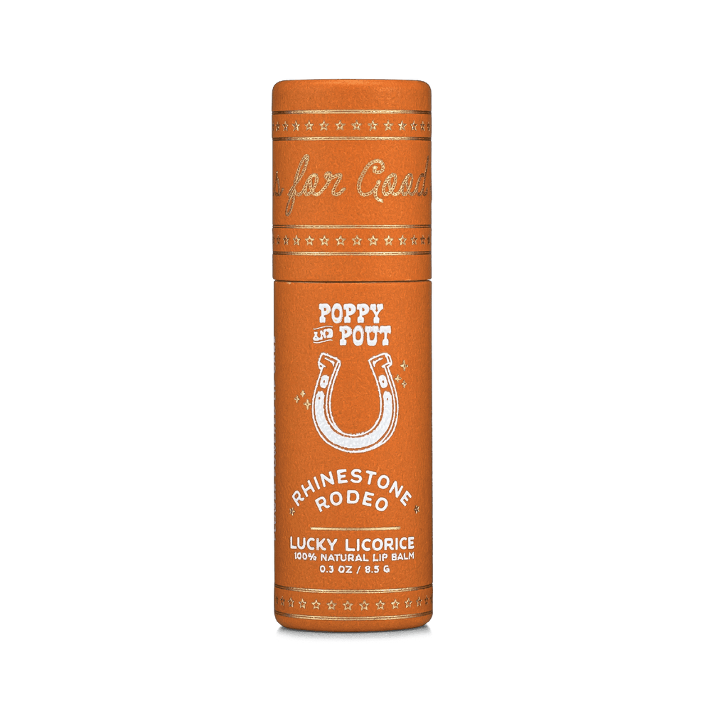 Orange Rhinestone Rodeo lip balm tube with Poppy and Pout and horseshoe graphic