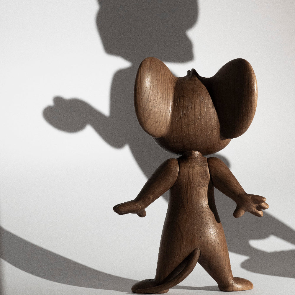 Small smoked oak figurine, front view with large ears and outstretched hands