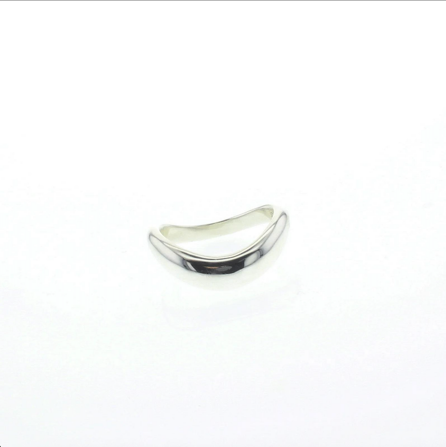 Sterling silver offshore ring with smooth curved wave design