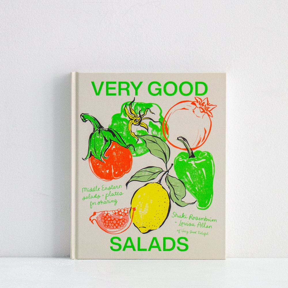 Salad cookbook with green and red vegetable cover illustration and title text