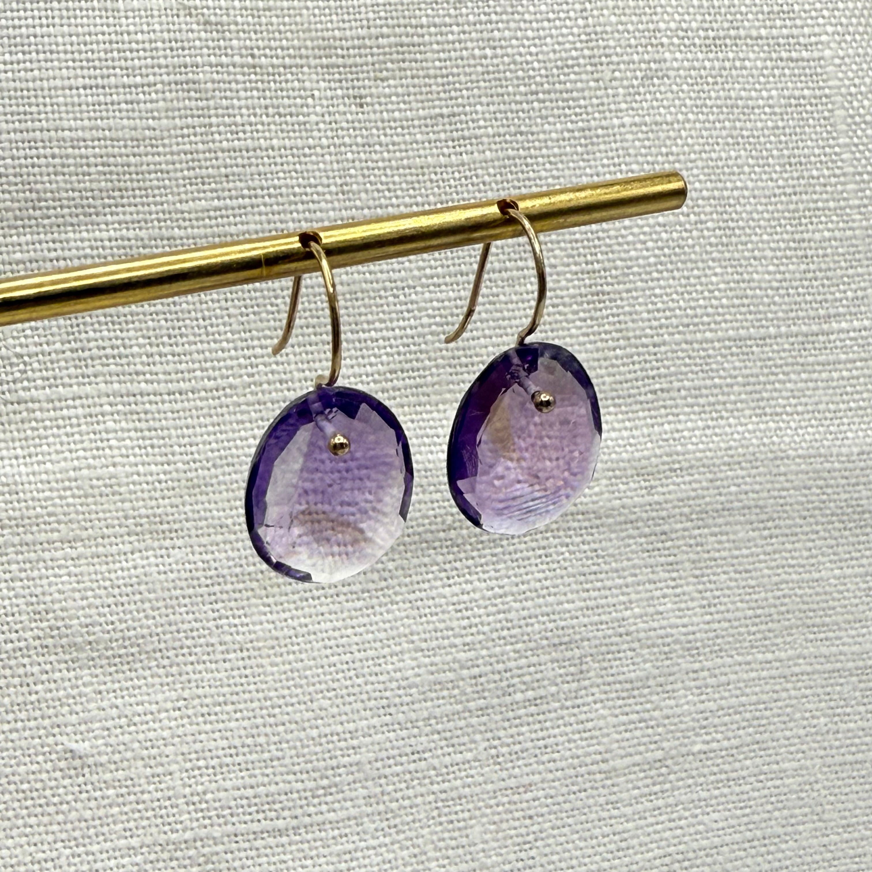 Amethyst purple faceted gold-filled drop earrings with oval stones and French hooks