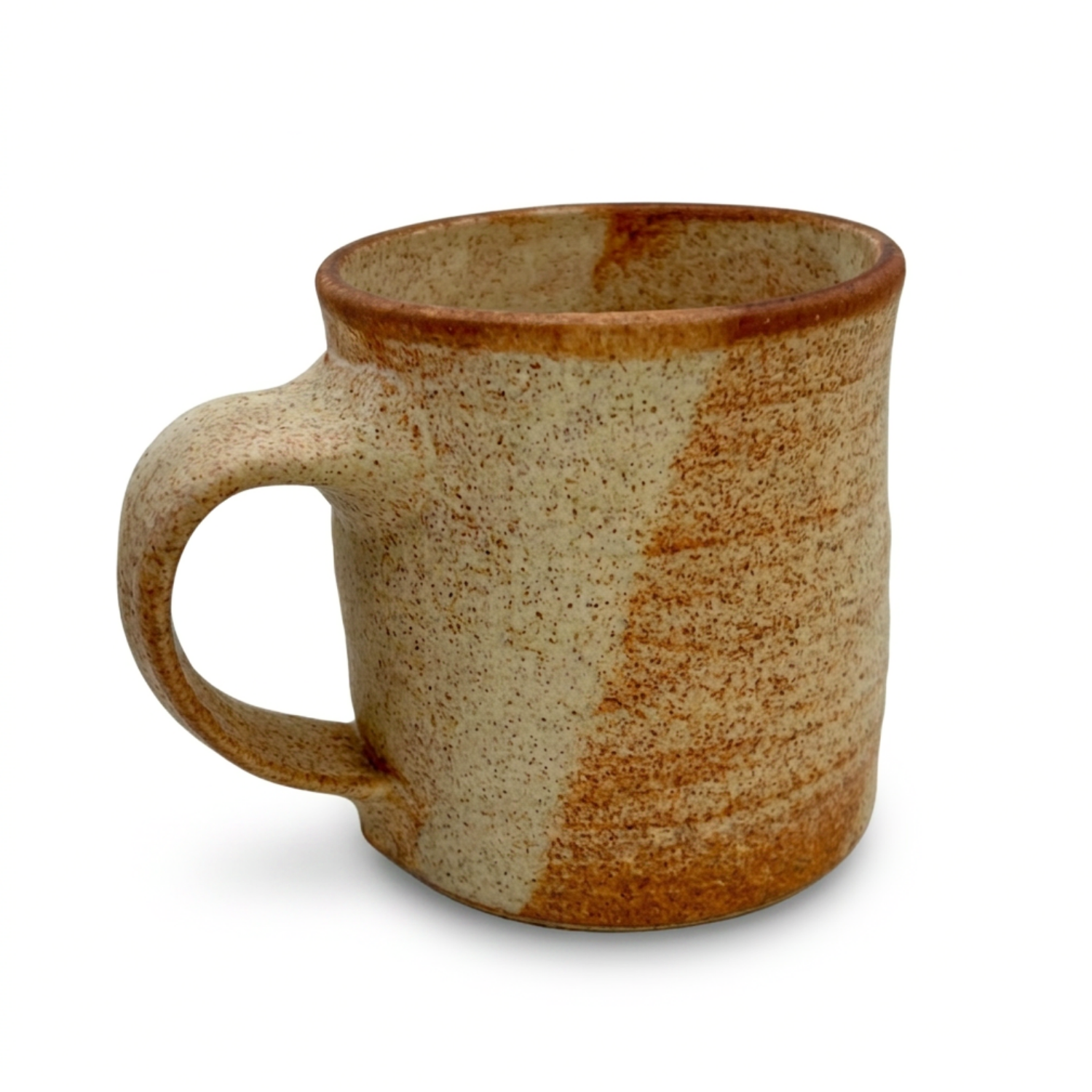 Two-tone amber speckled ceramic mug with curved handle and rounded rim
