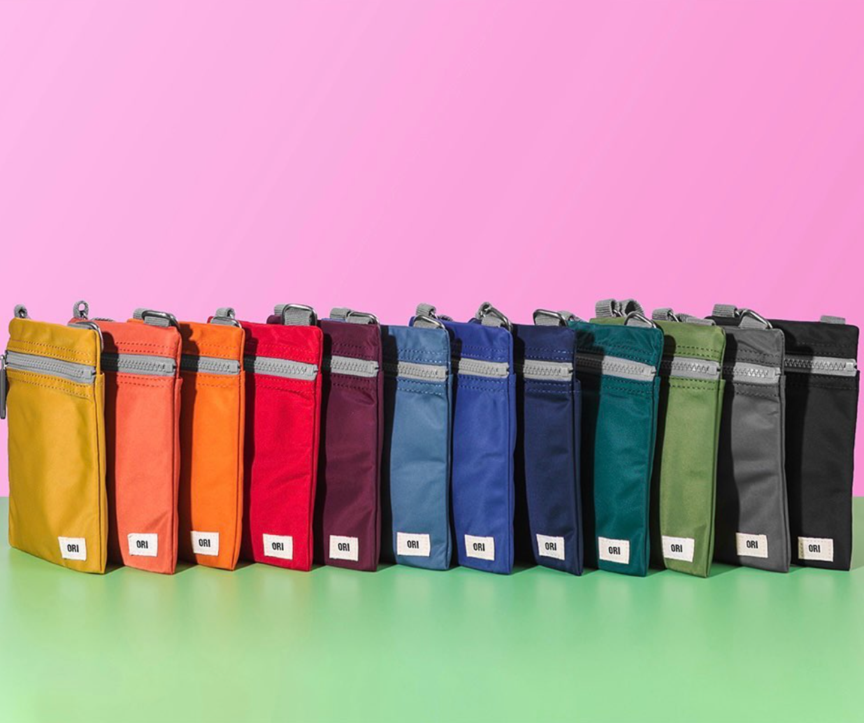 Recycled nylon pocket crossbody bags, assorted colors row display