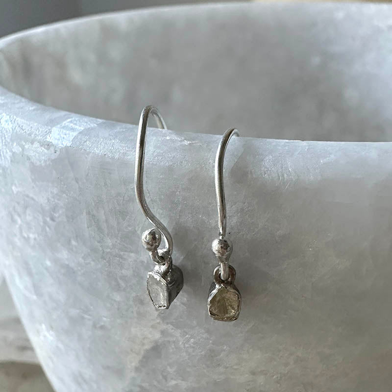 Sterling silver polki diamond hook earrings with small faceted dangling stones