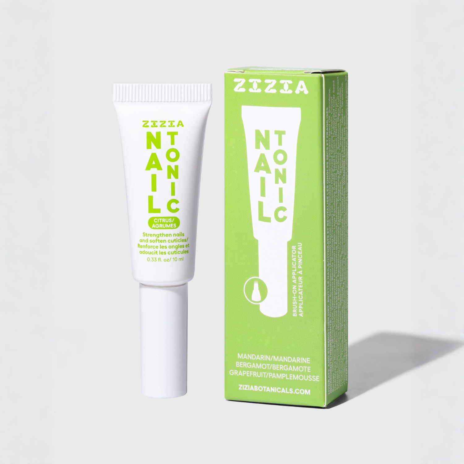 White nail cuticle oil tube and green retail box, Mandarin/Bergamot scent.