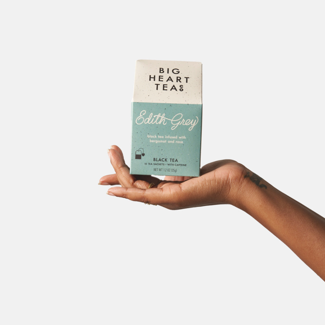 Organic tea carton in hand, Edith Grey black tea label visible (10 teabags)