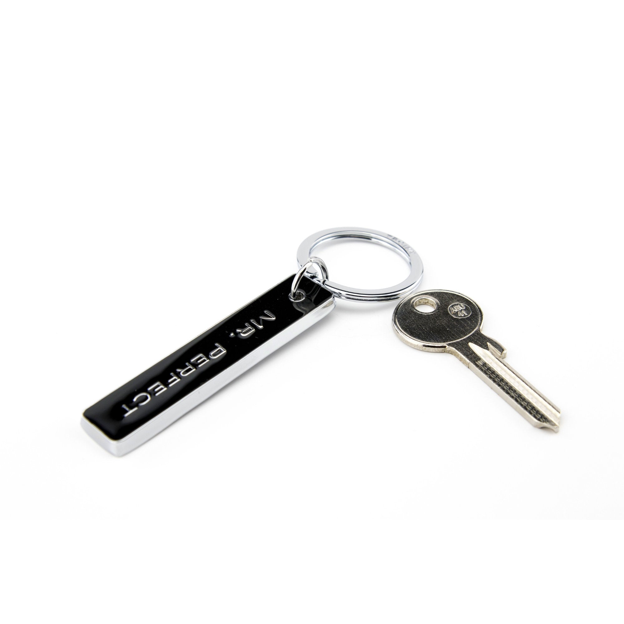 Mr. Perfect black enamel bar keychain with chrome split ring and key