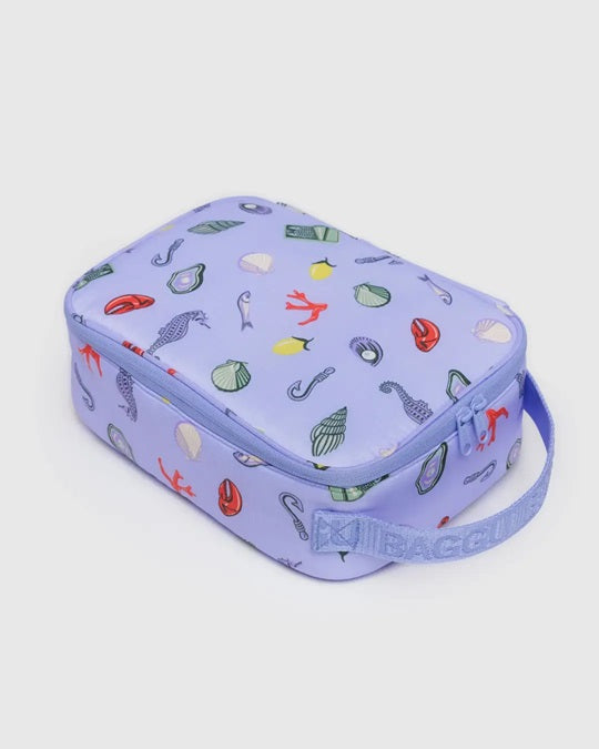 Purple icon-pattern lunch bag with zipper and side carry strap.