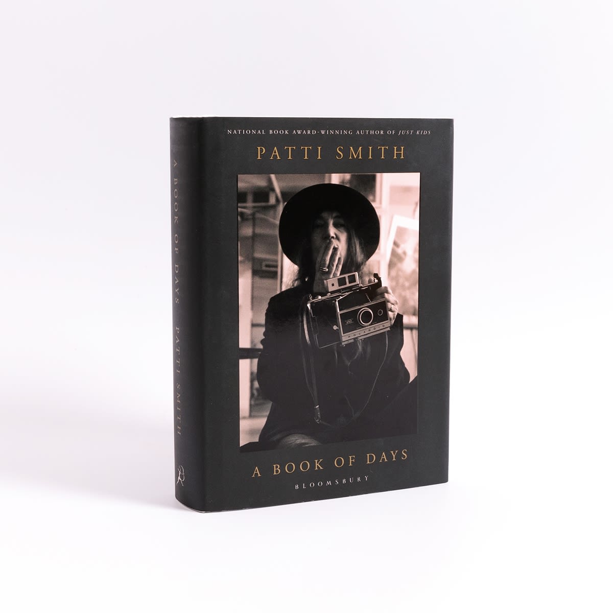 Book of Days: Patti Smith hardcover book with black cover and portrait holding camera